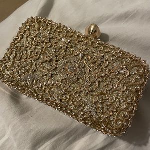 Gold clutch